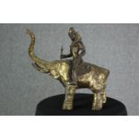 Brass figure riding an elephant. A Tibetan or maybe Hindu deity. Well sculpted and detailed. H.26