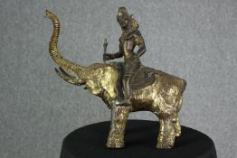 Brass figure riding an elephant. A Tibetan or maybe Hindu deity. Well sculpted and detailed. H.26