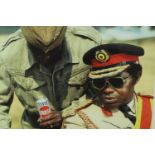 Idi Amin, photographic portrait. Amin was the third president of Uganda from 1971 to 1979. Signed