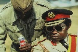 Idi Amin, photographic portrait. Amin was the third president of Uganda from 1971 to 1979. Signed