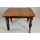 Dining table, late 19th century walnut. H.72 W.105 D.104cm. Leaf. 100cm. (Wind out mechanism but