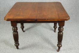 Dining table, late 19th century walnut. H.72 W.105 D.104cm. Leaf. 100cm. (Wind out mechanism but