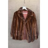 A vintage Mink fur coat made by Saga.