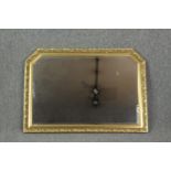 Overmantel mirror, gilt framed with bevelled plate. H.73 W.103cm.