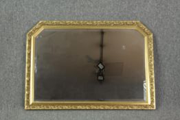 Overmantel mirror, gilt framed with bevelled plate. H.73 W.103cm.
