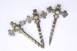 Three 19th century brass champagne taps. With detailed ornate design and stamped maker's mark.