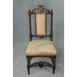 Child's chair, 19th century carved oak. H.94 cm.