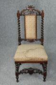 Child's chair, 19th century carved oak. H.94 cm.