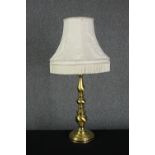 A large brass table lamp and shade. H.70cm.