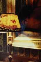 Photograph of a lamp shade decorated with a ship. Unsigned. Framed and glazed. H.36 x W.30 cm.