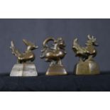 Chinese scroll weights. Three bronze chickens. Twentieth century. H.8 x W.5.5 x D.4 cm.
