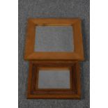 Two contemporary pine framed mirrors. H.36 W.30 and H.43 W.43 cm
