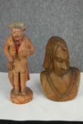A terracotta figure and a carved bust. The figure showing remains of colouring now mostly lost. H.