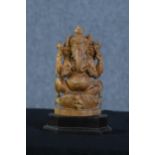 Ganesha Supreme God of the Ganapatya. Carved hardwood figure on a plinth. Probably mid twentieth