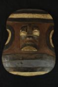 A polychrome Kidumu Teke West Africa mask. H.42 x W.31 cm. Est.