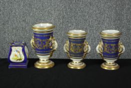 Three small urns and a pot. Nineteenth century. Hand painted and decorated in gilt. Probably French.