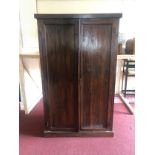 A Lombok Eastern teak wardrobe. H.187 W.115 D.63cm. (One hinge needs a repair).