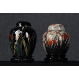 Two Japanese Otagini vases. Two lidded vases in a floral finish. Early twentieth century. H.17 W.