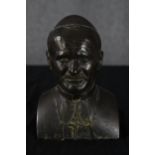 A bronze resin bust of Pope John Paul II. H.24 W.17 D.10 cm.