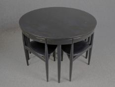 Hans Olsen for Frem Rojle, "Roundette" dining table and four chairs, Danish ebonised teak stamped to