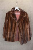 A vintage Mink fur coat made by Saga.