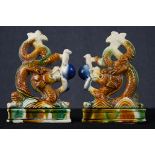 A pair of Chinese ceramic dragons finished in a Sancai glaze. Possibly bookends. H.20 W.13 D.4 cm.