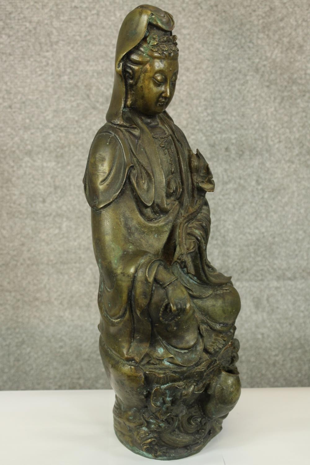 A large Chinese brass figure of Guanyin the Goddess associated with compassion. Probably early - Image 2 of 4