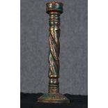 A turned hardwood candlestick with a copper finish. Probably Chinese. Early twentieth century but