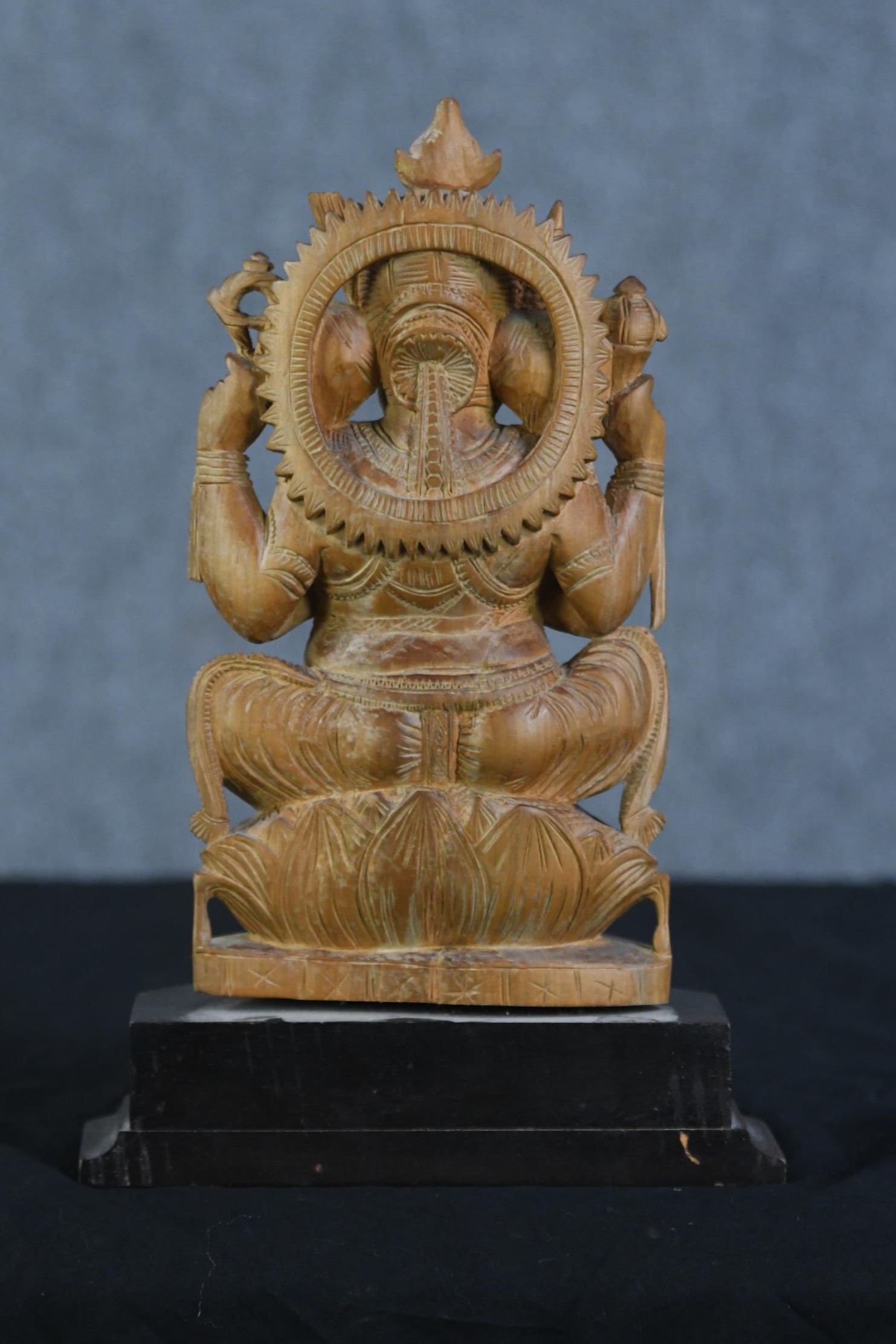 Ganesha Supreme God of the Ganapatya. Carved hardwood figure on a plinth. Probably mid twentieth - Image 3 of 3