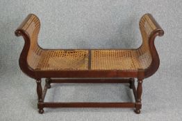 Window seat, caned mahogany. H.77 W.112 D.50cm.