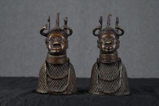 A pair of bronze busts. Possibly the King and Queen of Benin. A fine casting with detailed dress and