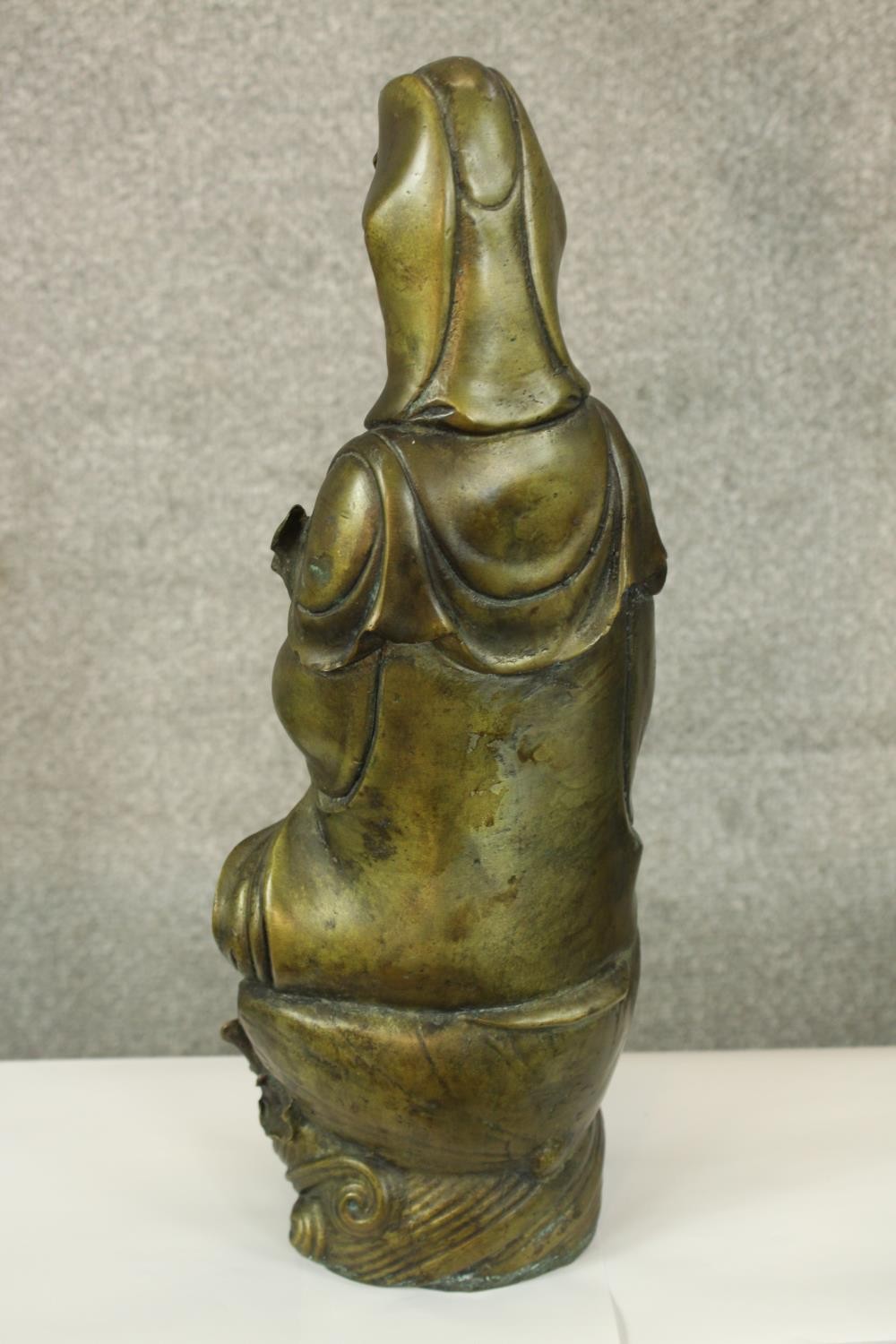 A large Chinese brass figure of Guanyin the Goddess associated with compassion. Probably early - Image 3 of 4