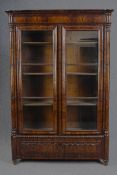 Library bookcase, late 19th century North European flame mahogany. H.182 W.115 D.38 cm.