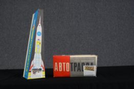 Vintage Hungarian Holdraketa tin friction space rocket. Also, traffic merry-go-round type toy. The