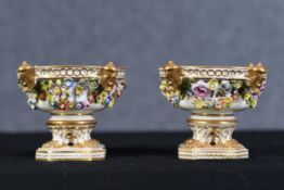 A pair of nineteenth century English Bloor Derby porcelain pastille burners. Missing their lids.