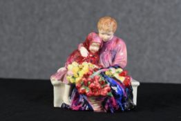 Royal Doulton. A figure group titled "Flower Sellers' Children" to the base.