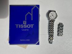 A ladies Tissot bi-metal quartz watch with articulated bracelet, white dial with roman numerals