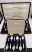 Two cased sets of engraved silver coffee spoons. A Mappin & Webb cased set of twelve coffee spoons
