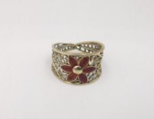 A 14ct yellow gold enamel wire work floral ring. Red enamel flower to the front, stamped 14K Ring