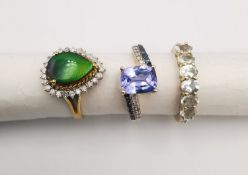 Three 20th century 9 carat gold gem-set rings, a ammolite and diamond drop shape cluster ring, a
