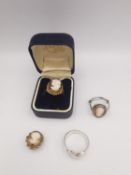 A collection cameo jewellery, including a 9ct carved cameo shell ring with rope twist border, a
