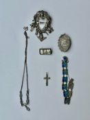 A collection of silver jewellery, including a silver and mother of pearl brooch, a Norwegian
