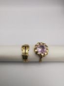 Two 9ct yellow gold rings, a Victorian engraved 9ct buckle ring and a amethyst set floral design