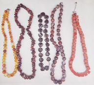 Five knotted agate and hardstone necklaces with silver clasps. A black agate bead necklace with