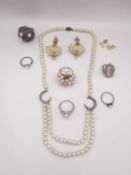 A collection of faux pearl and cultured pearl jewellery, including a ruby and marcasite dress