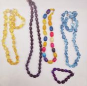 Four 20th century dyed agate bead necklaces and a bracelet, including a dyed agate bead necklace