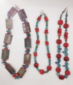 Three 20th century coral and turquoise necklaces, two with carved coral Chinese character beads