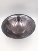 Harald Nielsen for Georg Jensen, a small footed bowl, pattern no. 575D, lightly planished and of