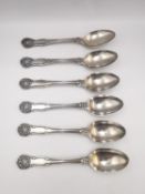 A set of six sterling silver shell pattern Georgian tea spoons. Hallmarked:MN for Michael Nixon,