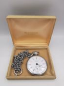 A stainless steel Tissot pocket watch and chain. White enamel dial with smaller seconds dial.